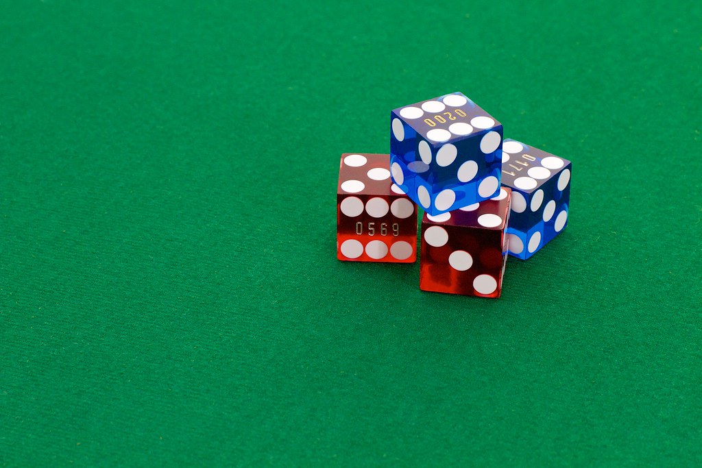 Dice resting on a casino table