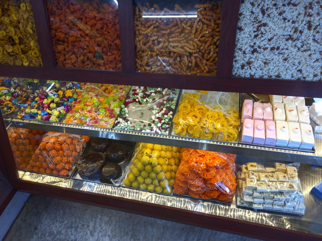 Shelf display of sweets and pastries in a confectionery shop